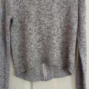 Light grey/orange sweater